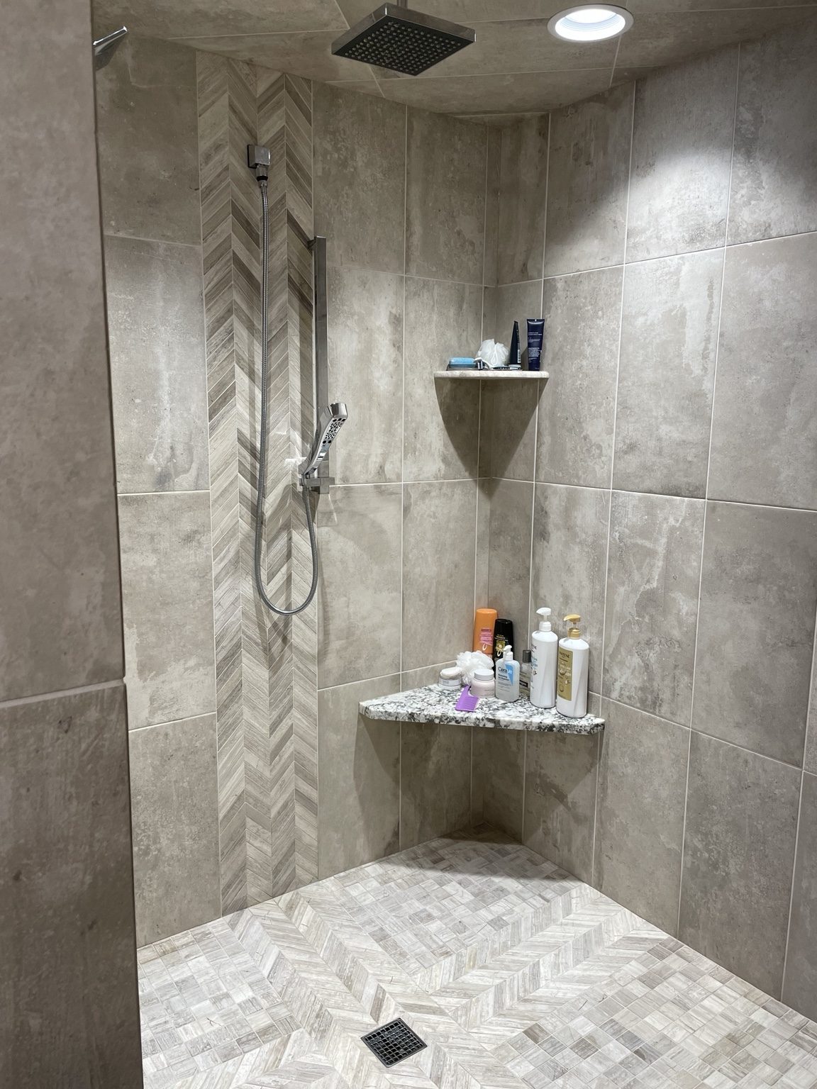 Detailed tile installation in a shower